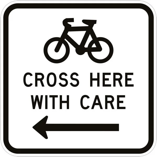 BICYCLES CROSS HERE WITH CARE