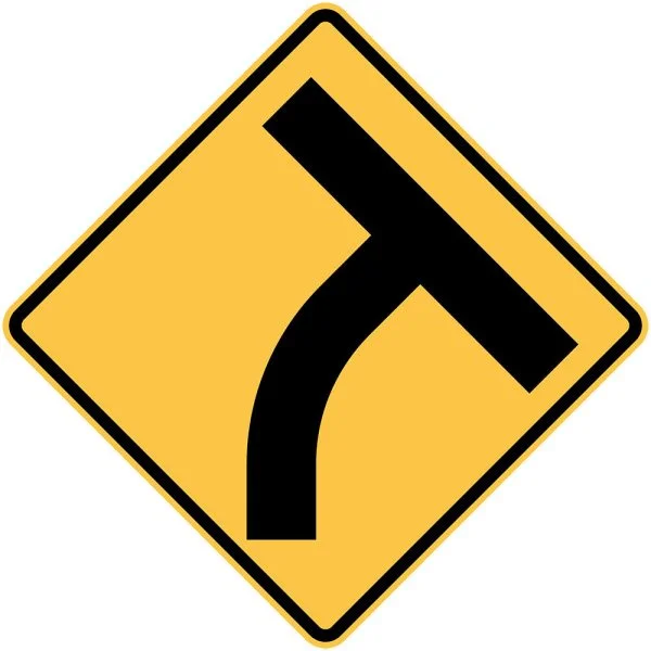 T INTERSECTION BEYOND A CURVE