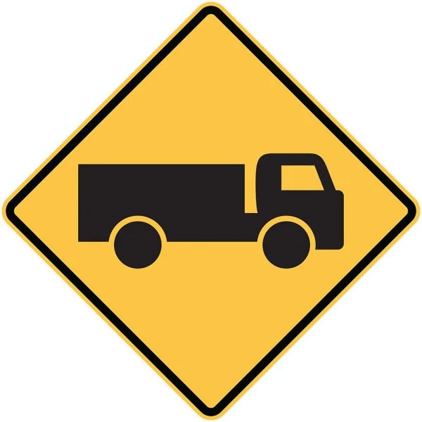 TRUCKS ENTERING OR CROSSING